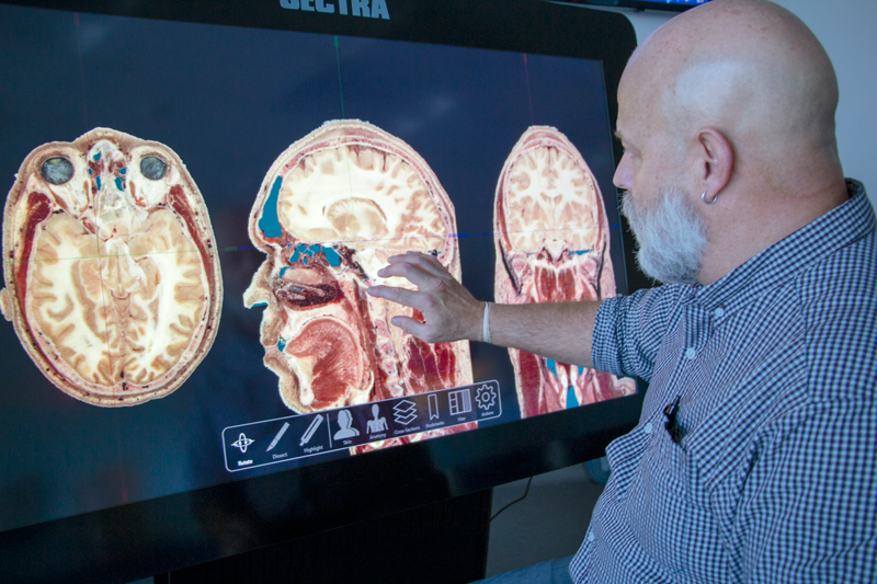 Photo of Jon Jackson in the gross anatomy lab.